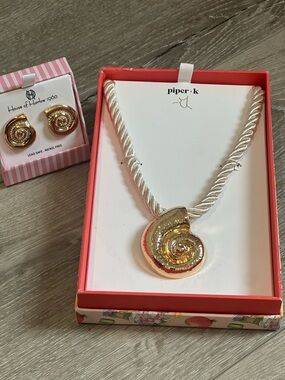 Piper·k Gold Spiral Shell Pendant Necklace on Twisted Cream Cord